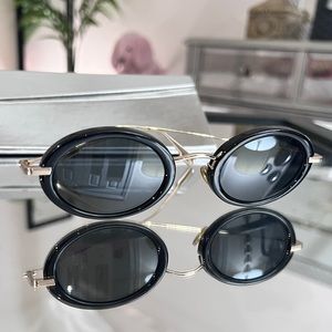 Dior mini-oval frame sunglasses
